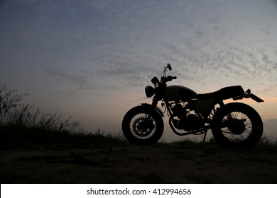 Background of vintage motorcycle in silhouette scene