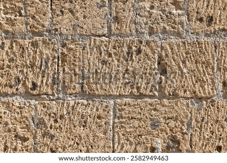 background of the volcanic stone called tuff used by the ancient Italian peoples for the construction of buildings