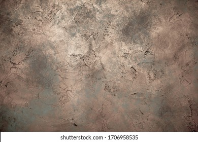 Background wall with abstract spots. Beautiful brown, bronze texture with stains, abstract surface background, modern bright painting of walls in trending shades, unusual spotty silver and gold surfac