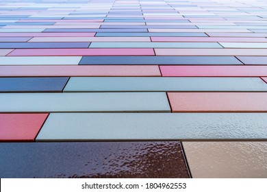 Background with wall of colorful rectangular tiles