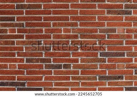 Background wall featuring long thin bricks with finely combed surface, clean mortar, horizontal aspect