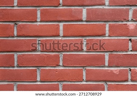 Background from a wall made of clean red bricks