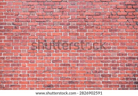 Background in wall pattern. Bricks on redbrick surface. Wall in mortar texture. Background for rustic facade.
