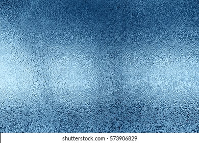 Background water drops on the glass - Shutterstock ID 573906829