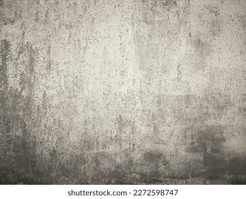 Background of white concrete wall.The scratched walls were smeared with cerulean oil.  Artistic background, abstract painting, hand drawn texture, crack on the wall of a damaged old building.