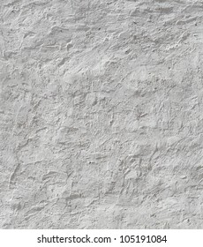 Background with white plaster wall with uneven surface - Shutterstock ID 105191084
