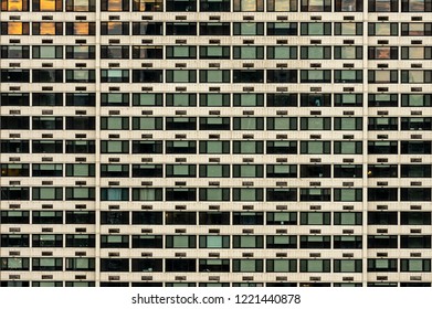 A background of windows of a skyscraper.