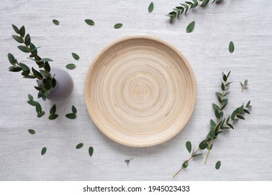 Background with wood table and greens, top view - Shutterstock ID 1945023433