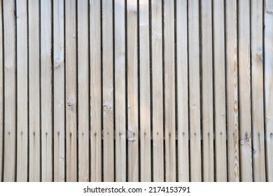 background of wooden boards planks with nails and crevices