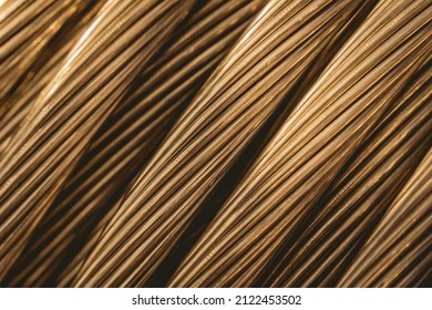 Background of wooden coils of electric cable outdoor. - Shutterstock ID 2122453502