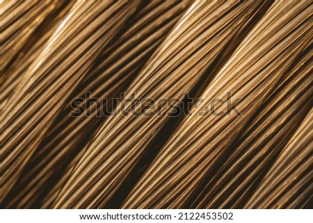 Background of wooden coils of electric cable outdoor.