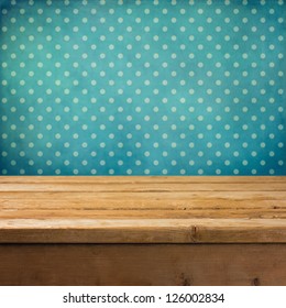 Background With Wooden Deck Table And Vintage Polka Dots Wallpaper