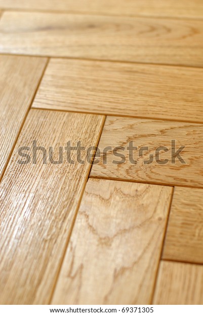 background\
wooden parquet floor herringbone\
pattern