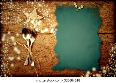 Background for writing the Christmas menu, parchment on old wooden table with stars