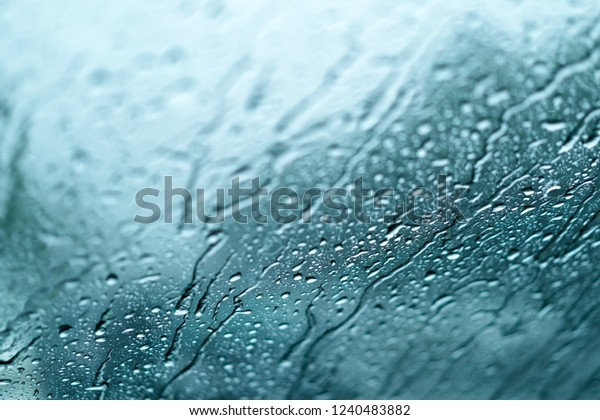 background.rain. Rain\
drips. Water droplets\
flow.
