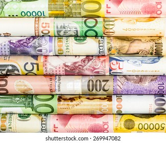 A backgrounds with colorful of many roll currency,money from many country
