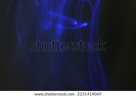 Backgrounds image of ray trajectory in a black background.
