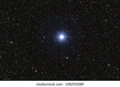  Backgrounds night sky with stars with 80 mm refracting telescope. Vega, the brightest star in the Lyra constellation, 25 light years from Earth.