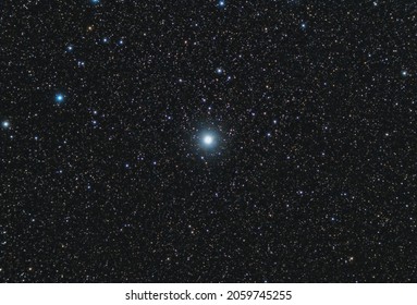  Backgrounds night sky with stars with 80 mm refracting telescope. Mirfak, the brightest star in the Perseus constellation, more than 500 light years from Earth.