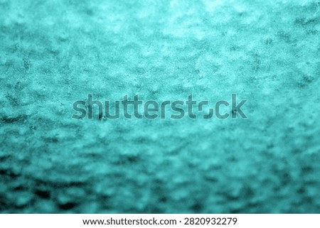 Backgrounds and Textures. Soap and Water splash and spread upon a glass window. Water on glass. Wet Background. Liquid Dreams. Water washes away dirt. Car Wash. Wet Window. Bubble Bath. Water on glass