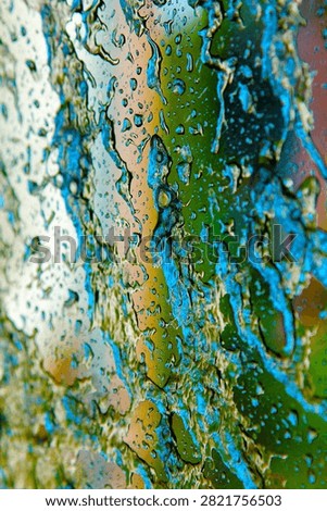Backgrounds and Textures. Soap and Water splash and spread upon a glass window. Water on glass. Wet Background. Liquid Dreams. Water washes away dirt. Car Wash. Wet Window. Bubble Bath. Water on glass