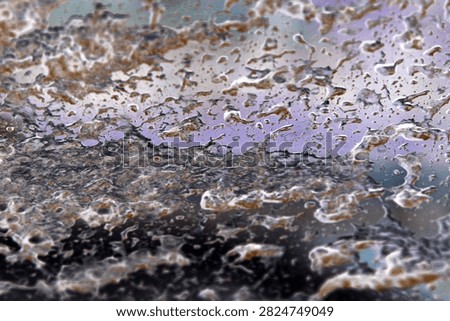 Backgrounds and Textures. Soap and Water splash and spread upon a glass window. Water on glass. Wet Background. Liquid Dreams. Water washes away dirt. Car Wash. Wet Window. Bubble Bath. Water on glass