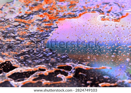 Backgrounds and Textures. Soap and Water splash and spread upon a glass window. Water on glass. Wet Background. Liquid Dreams. Water washes away dirt. Car Wash. Wet Window. Bubble Bath. Water on glass