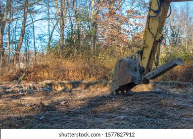 Backhoe Clearing Foundation For New House Lot