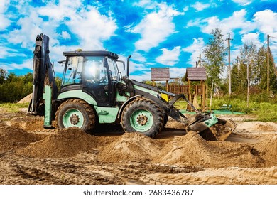 Backhoe is executing ground shaping work as part of site preparation process ensuring surface adjustment for further construction activity.