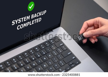 backing up data to an external flash drive. Secure data storage.