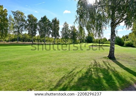 backlight over green and fairway on Kumla golf course