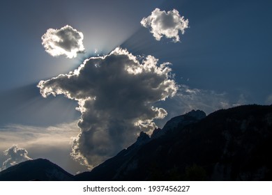 backlit clouds over the mountains
