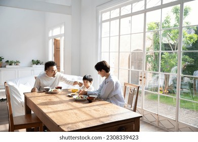 Backlit, a happy family table, a meal to eat. wide angle - Powered by Shutterstock