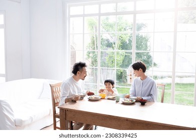 Backlit, a happy family table, a meal to eat. wide angle - Powered by Shutterstock