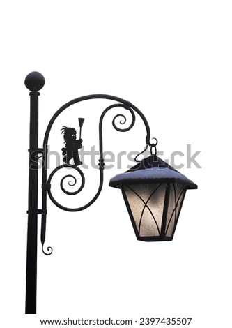 A backlit street lamp in the winter  with a transparent background