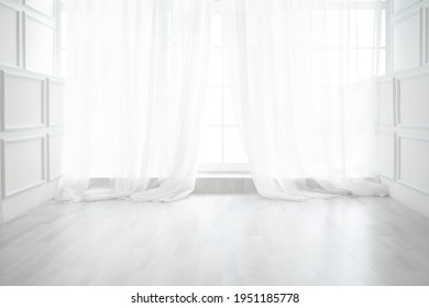 Backlit window with white curtains in empty room - Shutterstock ID 1951185778