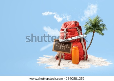 Backpack with an airplane on a colored background. World tourism day concept