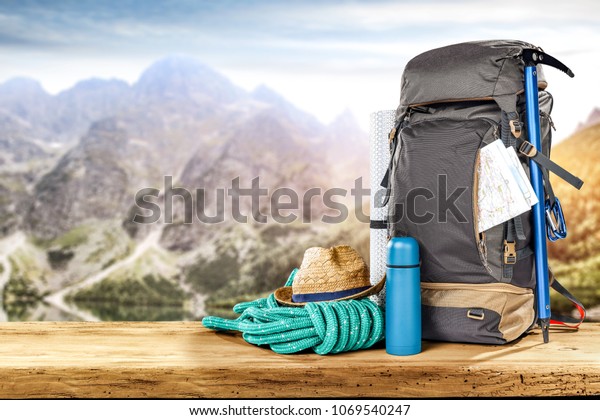 Backpack On Desk Mountains Landscape Lake Stock Photo Edit Now