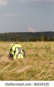 Backpack on mountain hill