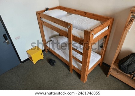 Backpacker dormitory room with bunk beds