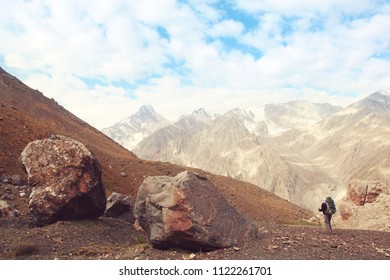 Backpacker in mountains