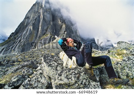 Image, Stock Photo Backpacker resting.