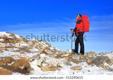 Similar – Hiker photographs the landscape