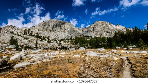 Backpacking The Pacific Crest Trail In Summer Crossing Donohue Pass Between Ansel Adams Wilderness And Yosemite National Park In California