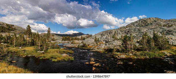 Backpacking The Pacific Crest Trail In Summer Crossing Donohue Pass Between Ansel Adams Wilderness And Yosemite National Park In California