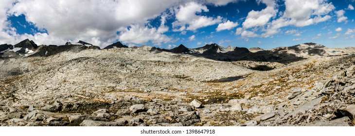 Backpacking The Pacific Crest Trail In Summer Crossing Donohue Pass Between Ansel Adams Wilderness And Yosemite National Park In California