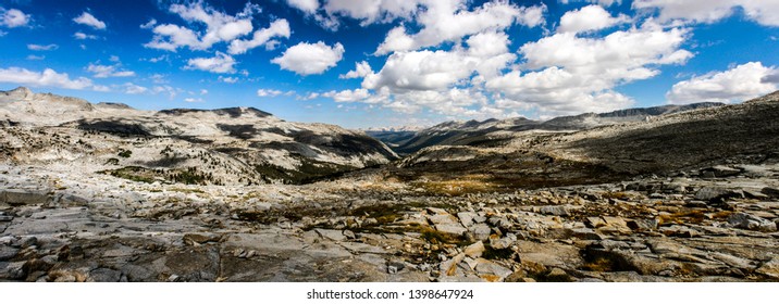 Backpacking The Pacific Crest Trail In Summer Crossing Donohue Pass Between Ansel Adams Wilderness And Yosemite National Park In California