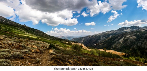 Backpacking The Pacific Crest Trail In Summer Crossing Donohue Pass Between Ansel Adams Wilderness And Yosemite National Park In California