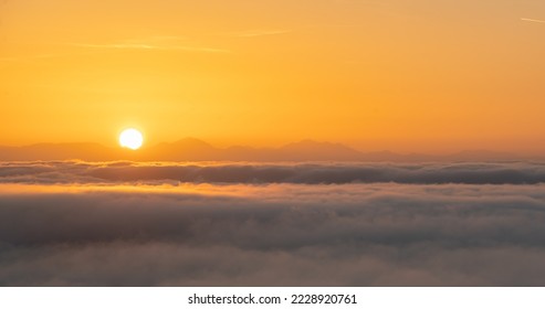 Backplate for CGI showing sunrise above the clouds-panorama - Shutterstock ID 2228920761