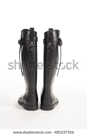 Image, Stock Photo Shiny rubber boots in the rain in front of a puddle-